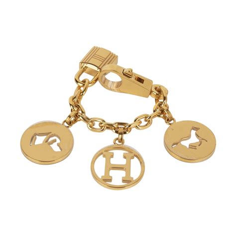 hermes olga bag charm gold|Hermes Limited Edition Breloque Olga Bag Charm in Gold.